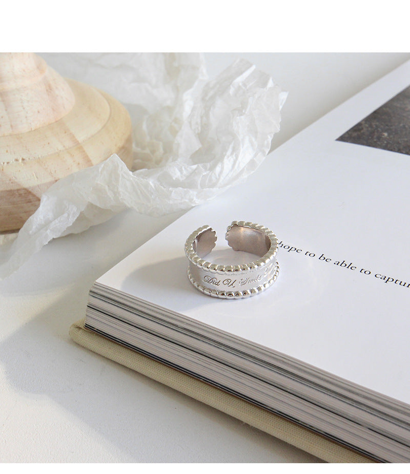 HJZ475 韩版S925纯银时尚个性CHIC风简约圆珠边宽面英文开口戒指