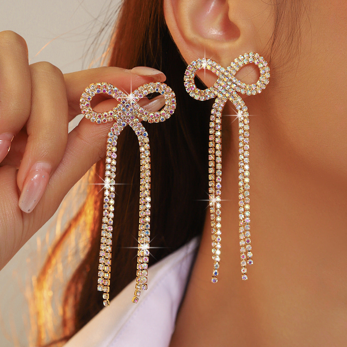 全铜 百搭蝴蝶结长款流苏耳环 时尚闪亮水钻耳钉无耳洞耳夹款