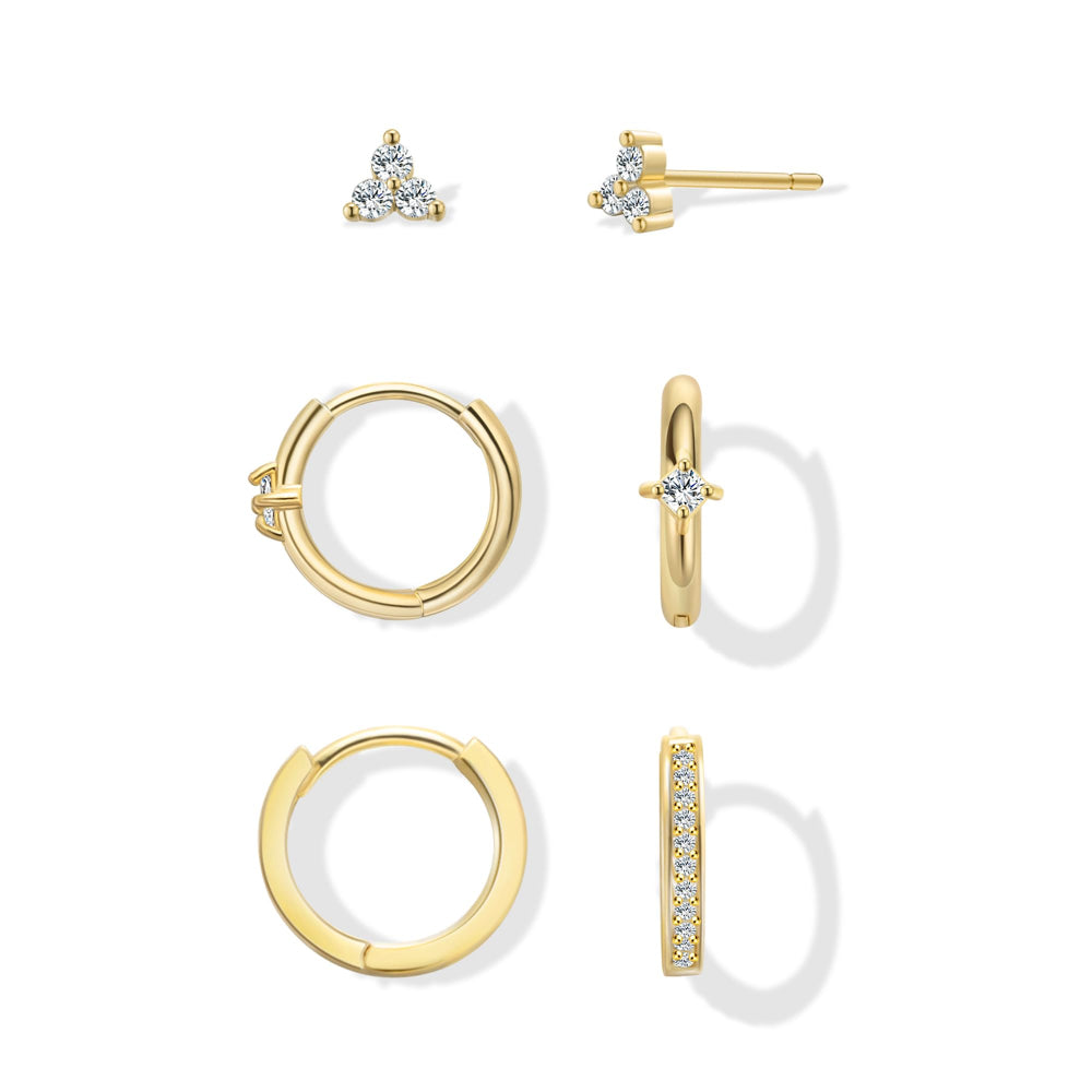 Dainty gold huggie earrings for women with pearl dangle, worn by model, minimalist 14k gold plated trendy earrings