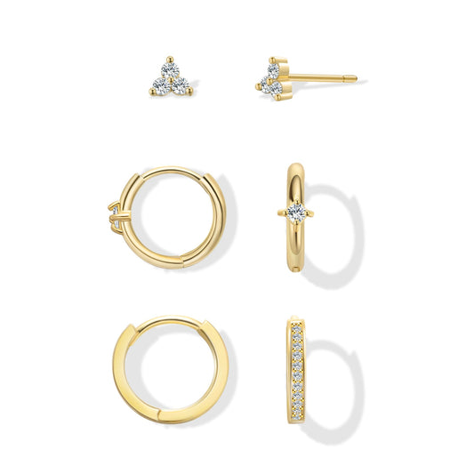 Dainty gold huggie earrings for women with pearl dangle, worn by model, minimalist 14k gold plated trendy earrings